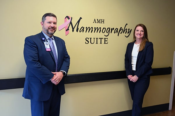 Ashe Memorial Hospital CEO Brian Yates and Tasha Rountree, Blue Ridge Energy director of community relations, outside the hospital’s Mammography Suite, which will receive new 3D mammography equipment. (Photo By: Blue Ridge Energy)